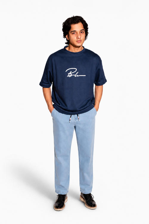 Beleri London Ice Blue drawstring jeans, light denim, front pockets, worn with sneakers