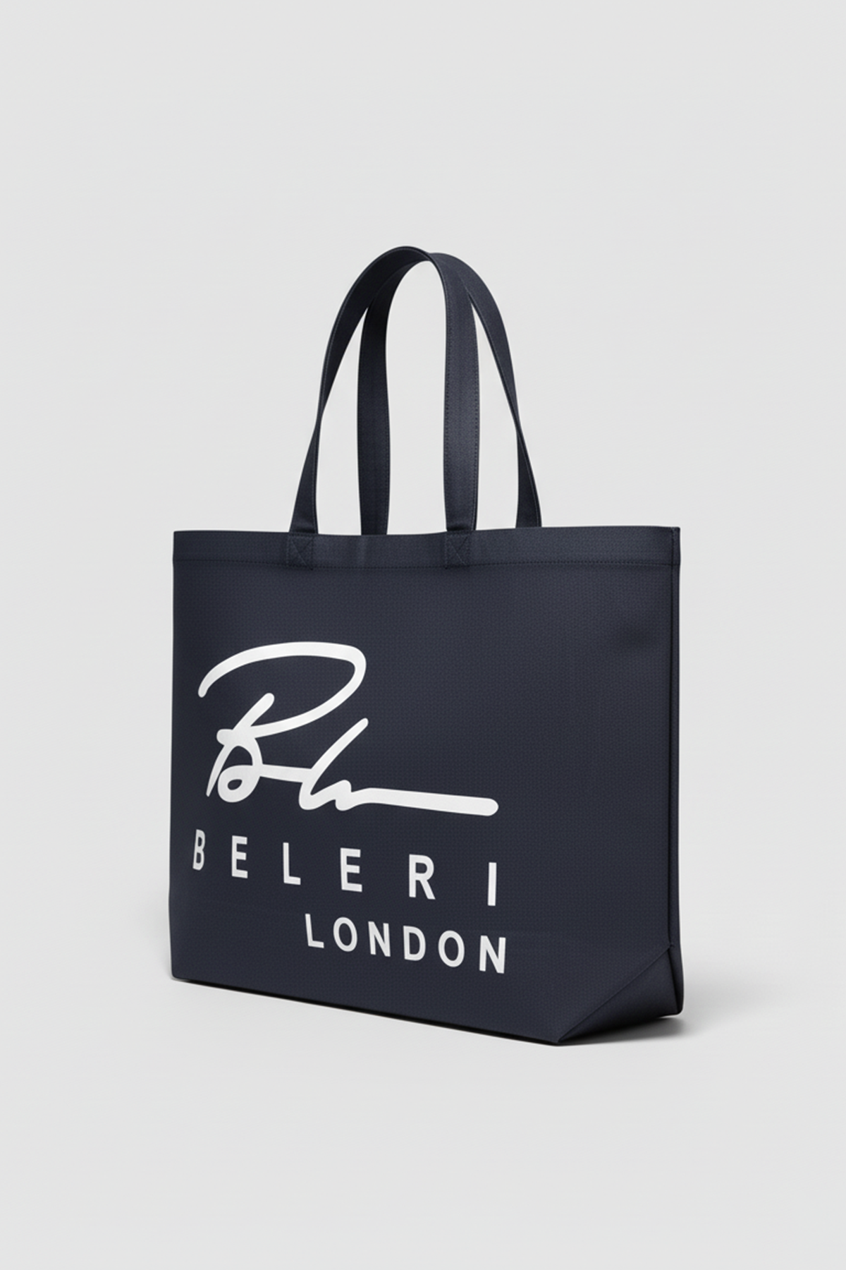 Jet black Beleri London tote bag with white script logo, angled side view