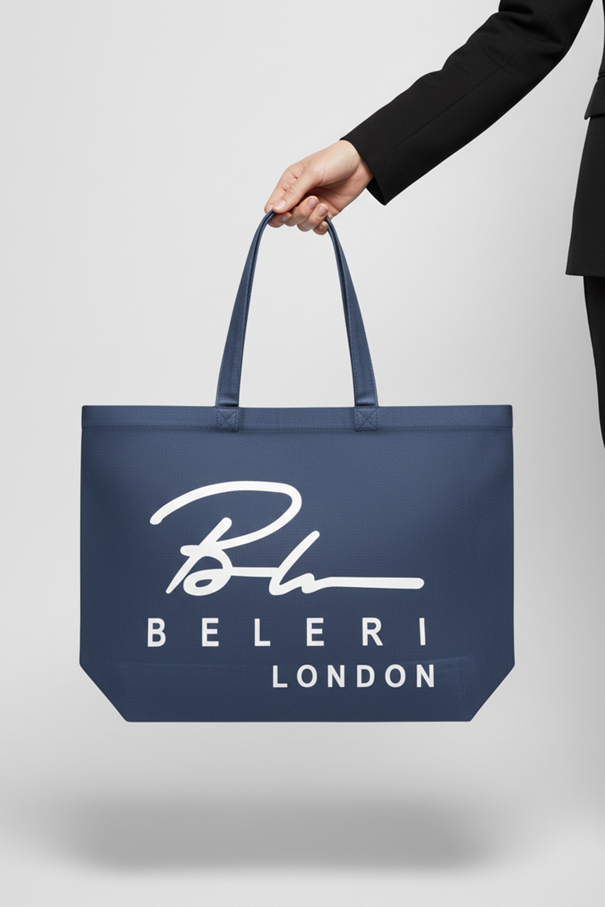 Indigo blue Beleri London tote bag with white logo and double handles