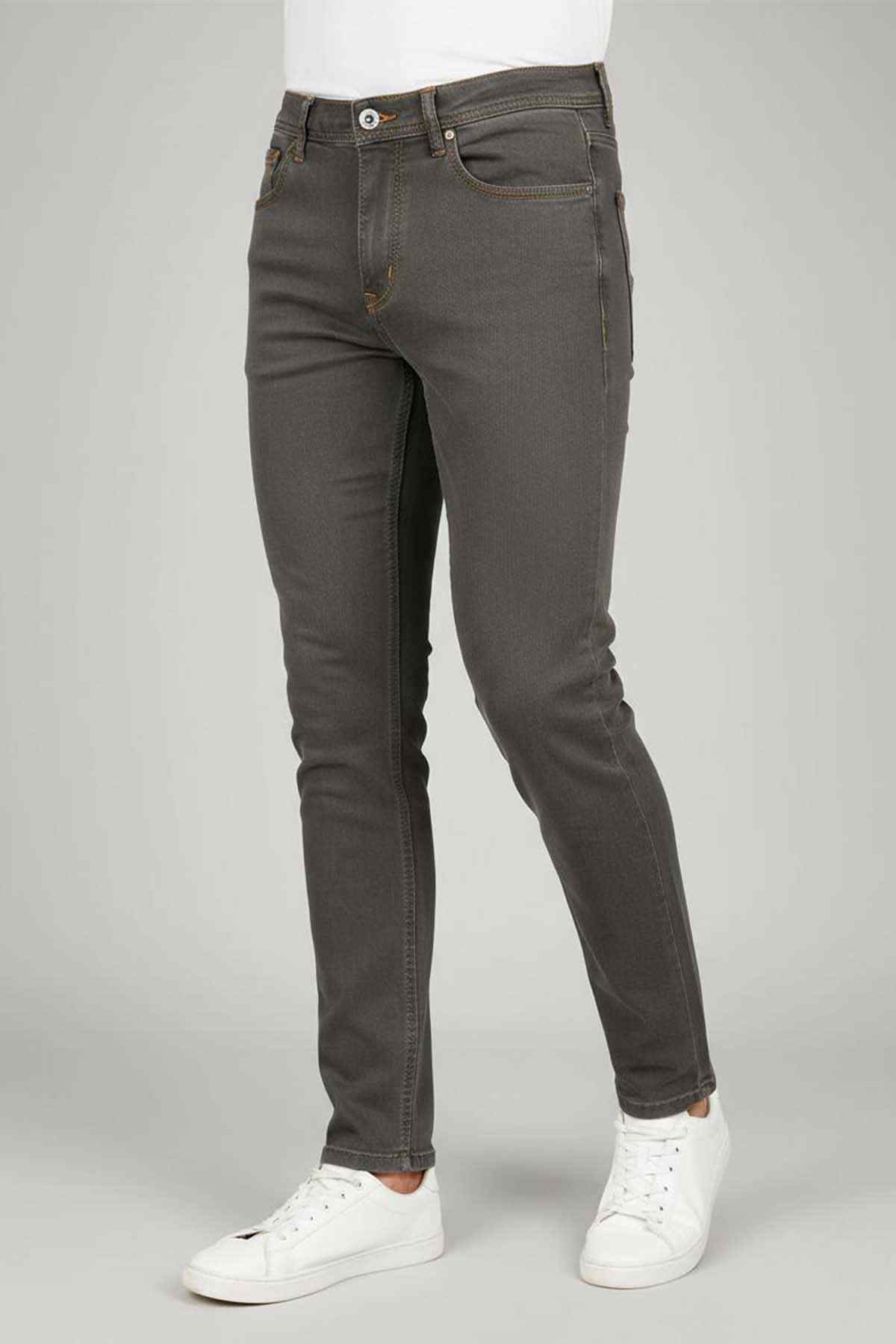 Olive green denim jeans with button waist and five-pocket design