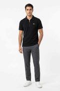 Black short-sleeve polo shirt with pointed collar and chest logo
